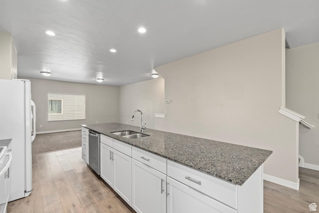 14728 S Rising Star Way W, Bluffdale, UT 84065 - kitchen with stainless steel dishwasher, white cabinetry, freestanding refrigerator, light wood-style floors, and recessed lighting