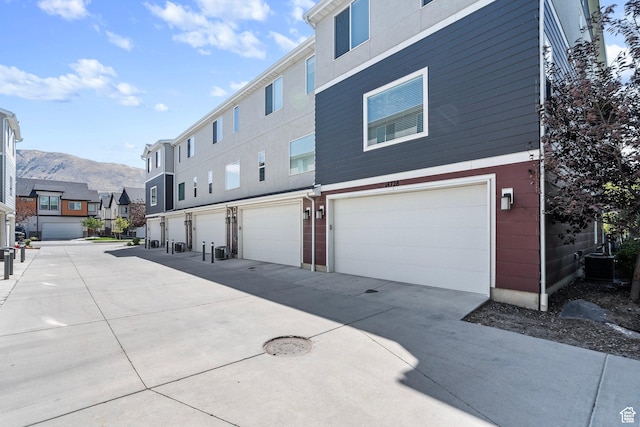 14728 S Rising Star Way W, Bluffdale, UT 84065 - exterior space featuring a residential view, an attached garage, and a mountain view