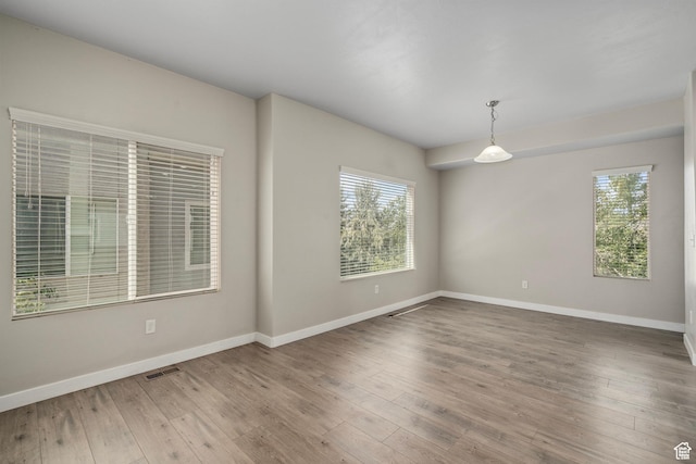 14728 S Rising Star Way W, Bluffdale, UT 84065 - spare room with wood finished floors