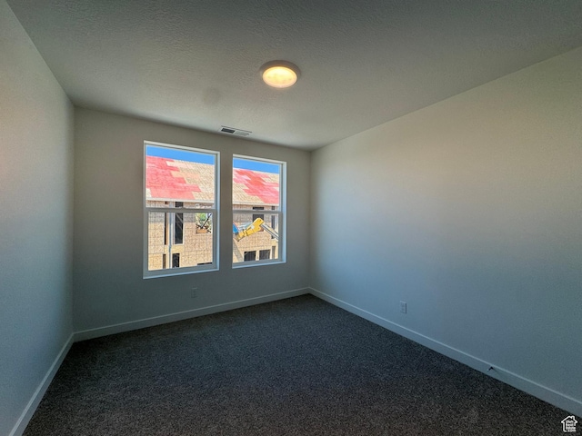 1452 N 1875 W Unit 146, Layton, UT 84041 - empty room featuring dark carpet and baseboards