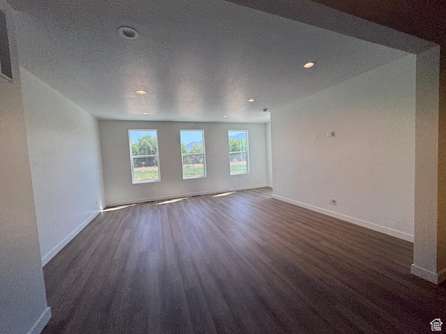1452 N 1875 W Unit 146, Layton, UT 84041 - unfurnished room featuring dark wood finished floors, recessed lighting, and a textured ceiling