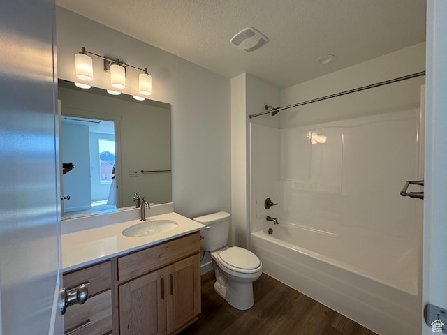 1452 N 1875 W Unit 146, Layton, UT 84041 - bathroom featuring wood finished floors, vanity, bathtub / shower combination, and a textured ceiling