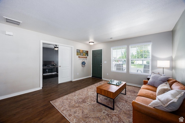 6733 W Mary Leizan Ln, Herriman, UT 84096 - living area featuring dark wood-style floors, a ceiling fan, and a textured ceiling