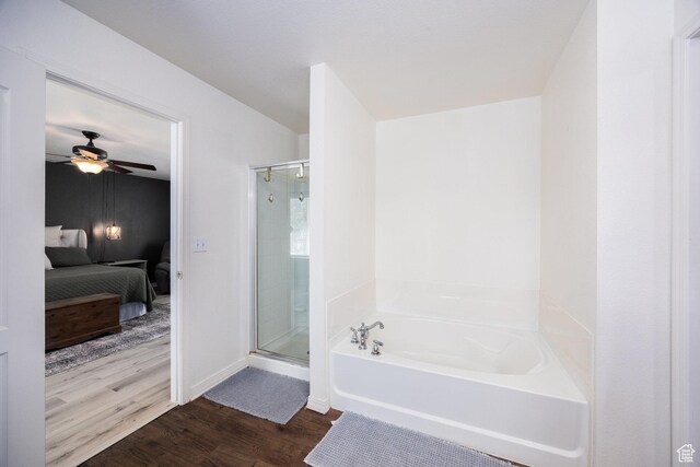 6733 W Mary Leizan Ln, Herriman, UT 84096 - ensuite bathroom with a shower stall, a garden tub, wood finished floors, and a ceiling fan