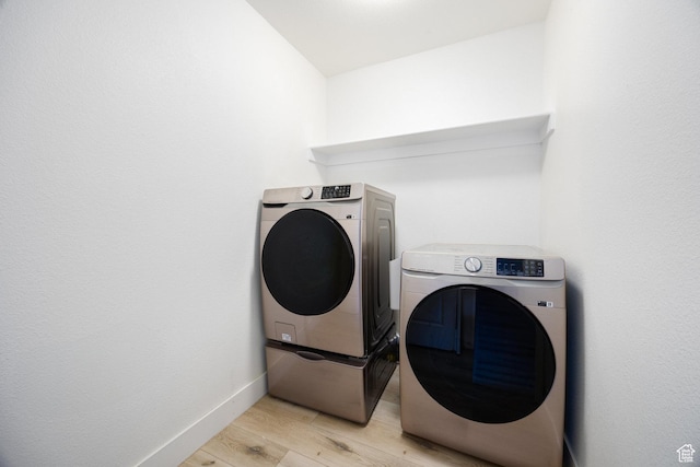 6733 W Mary Leizan Ln, Herriman, UT 84096 - laundry area featuring washer and clothes dryer and light wood-style flooring