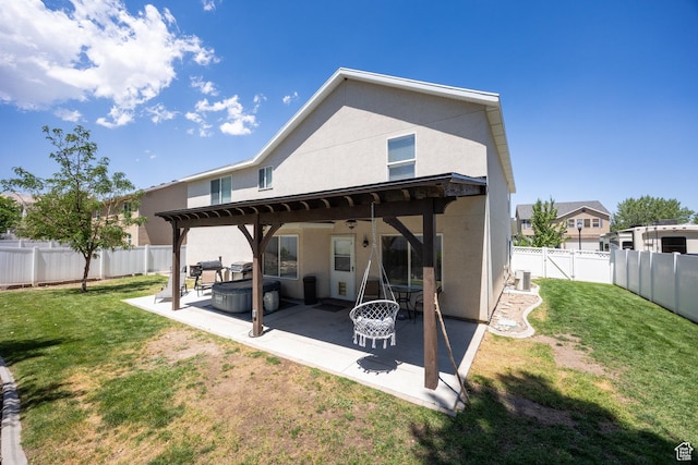 6733 W Mary Leizan Ln, Herriman, UT 84096 - back of house with a fenced backyard, a patio area, stucco siding, and a pergola