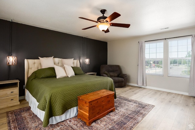 6733 W Mary Leizan Ln, Herriman, UT 84096 - bedroom with wood finished floors and a ceiling fan