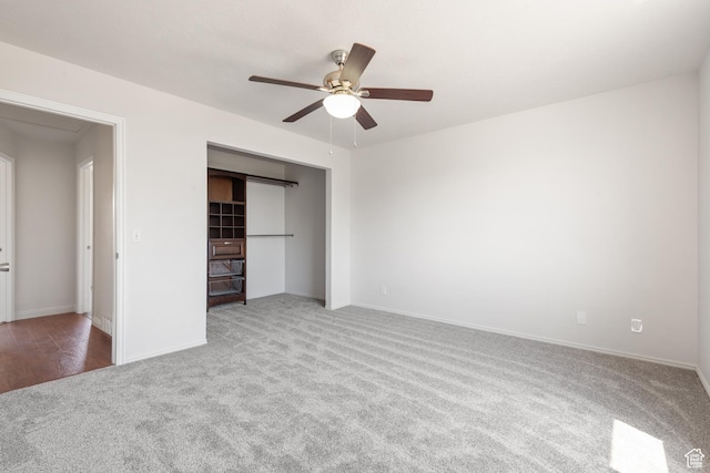 5131 W Parr Dr, West Jordan, UT 84081 - unfurnished bedroom featuring carpet, a ceiling fan, and a closet