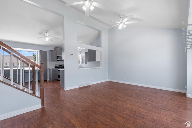 5131 W Parr Dr, West Jordan, UT 84081 - unfurnished living room with a ceiling fan, stairs, and dark wood-style floors