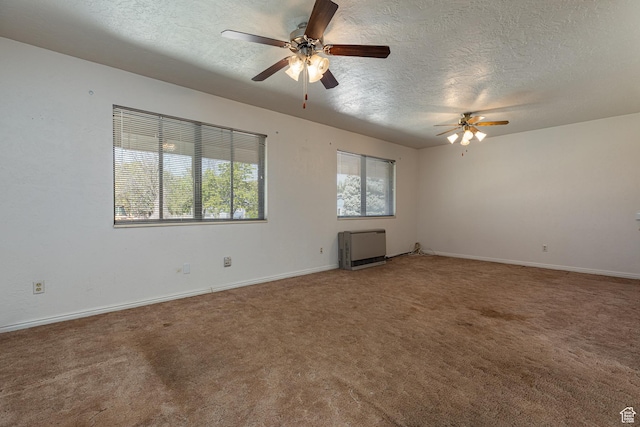 437 S 100 W, Kanab, UT 84741 - carpeted empty room featuring a textured ceiling, ceiling fan, and heating unit