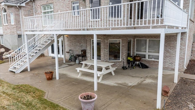 27 Canterbury Ln, Logan, UT 84321 - view of patio / terrace featuring stairs