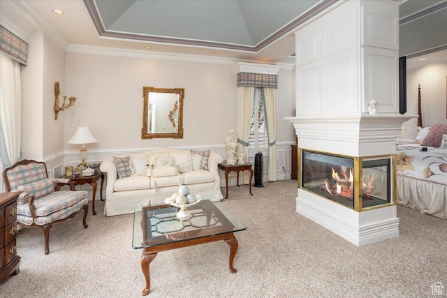 27 Canterbury Ln, Logan, UT 84321 - living area featuring crown molding, light carpet, a multi sided fireplace, a wainscoted wall, and recessed lighting