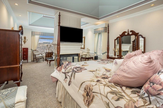 27 Canterbury Ln, Logan, UT 84321 - bedroom with a multi sided fireplace, ornamental molding, light colored carpet, and a tray ceiling