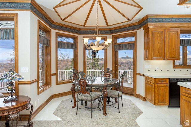 27 Canterbury Ln, Logan, UT 84321 - dining room featuring a chandelier, crown molding, and light tile patterned flooring