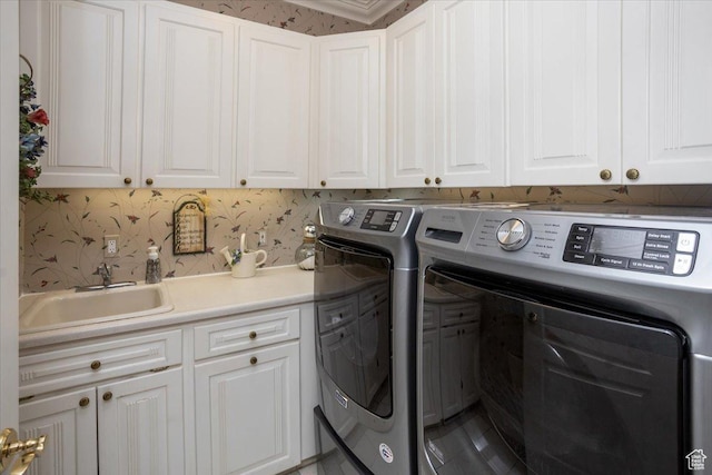 27 Canterbury Ln, Logan, UT 84321 - laundry room featuring cabinet space and washer and dryer