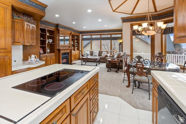 27 Canterbury Ln, Logan, UT 84321 - kitchen featuring tile countertops, black electric cooktop, dishwashing machine, a chandelier, and light colored carpet