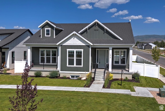 1919 S Sawmill Blvd E, Heber City, UT 84032 - view of front of property featuring a porch, board and batten siding, a shingled roof, and a mountain view