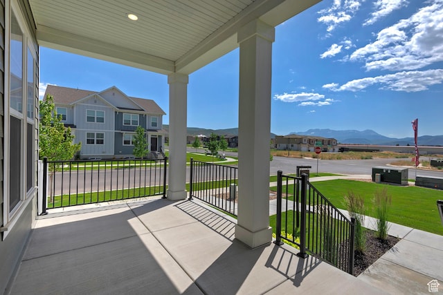 1919 S Sawmill Blvd E, Heber City, UT 84032 - porch featuring a mountain view, a residential view, and a yard