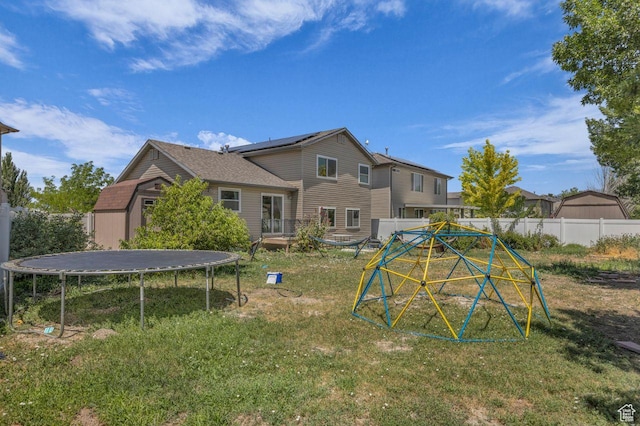158 N Walton Ct W, North Salt Lake, UT 84054 - back of property with a trampoline and a storage unit