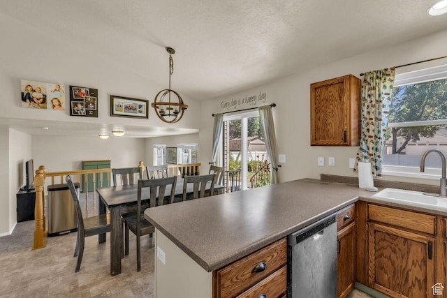 158 N Walton Ct W, North Salt Lake, UT 84054 - kitchen with dishwasher, brown cabinets, a peninsula, dark countertops, and a textured ceiling