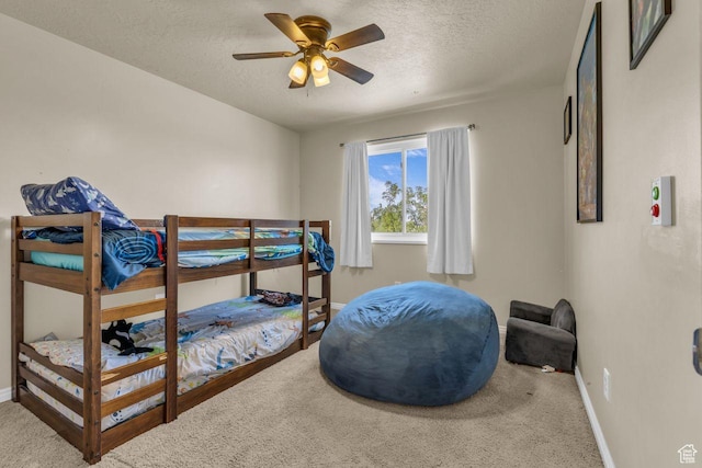 158 N Walton Ct W, North Salt Lake, UT 84054 - carpeted bedroom featuring a textured ceiling and a ceiling fan