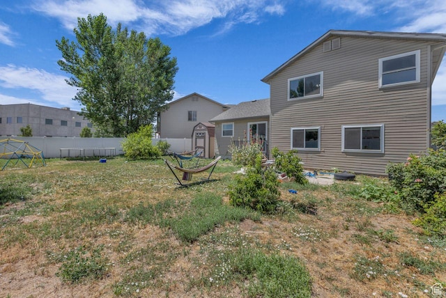 158 N Walton Ct W, North Salt Lake, UT 84054 - rear view of property featuring a storage unit