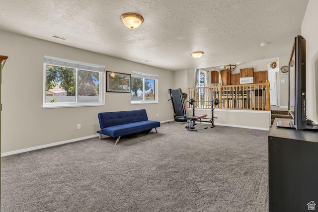 158 N Walton Ct W, North Salt Lake, UT 84054 - living area featuring a textured ceiling and carpet floors