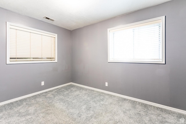 1844 Sorrento Dr, Woods Cross, UT 84087 - carpeted spare room featuring baseboards