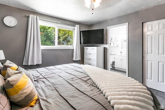 1844 Sorrento Dr, Woods Cross, UT 84087 - bedroom featuring a textured ceiling, ensuite bath, and carpet