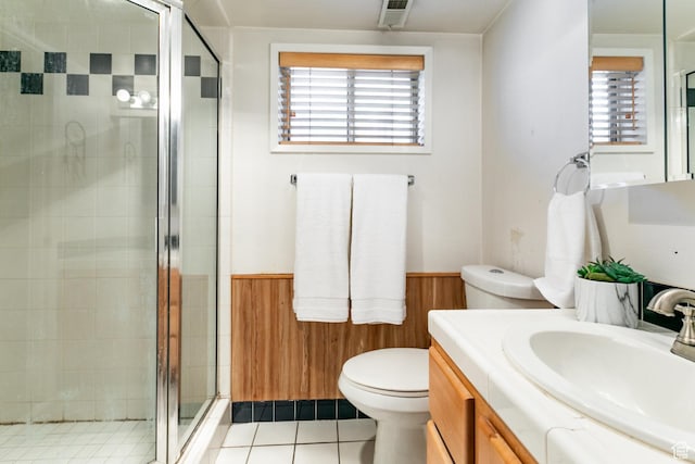 1844 Sorrento Dr, Woods Cross, UT 84087 - full bath featuring vanity, a stall shower, tile patterned floors, and a wainscoted wall