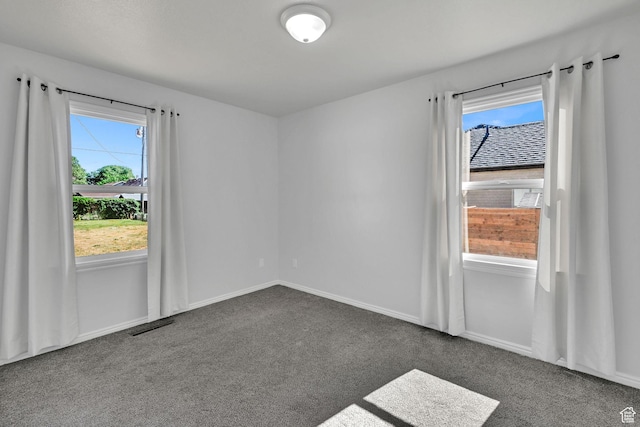 363 E Factory St, Garland, UT 84312 - unfurnished room with dark carpet