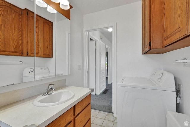 363 E Factory St, Garland, UT 84312 - bathroom with washer and dryer, vanity, and tile patterned floors