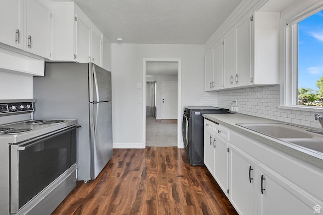 363 E Factory St, Garland, UT 84312 - kitchen featuring white range with electric stovetop, white cabinetry, and dark wood-type flooring
