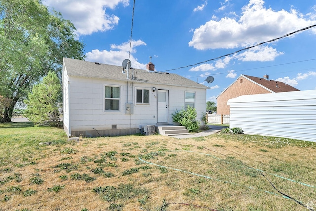 363 E Factory St, Garland, UT 84312 - back of property with a chimney and crawl space
