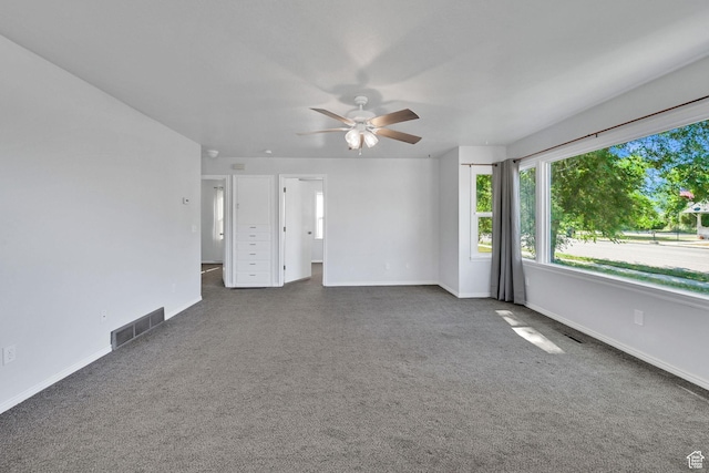 363 E Factory St, Garland, UT 84312 - spare room with ceiling fan and carpet floors