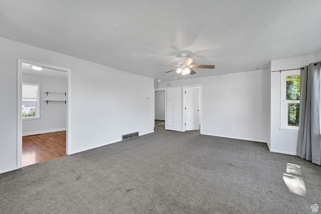 363 E Factory St, Garland, UT 84312 - carpeted empty room featuring ceiling fan and healthy amount of natural light