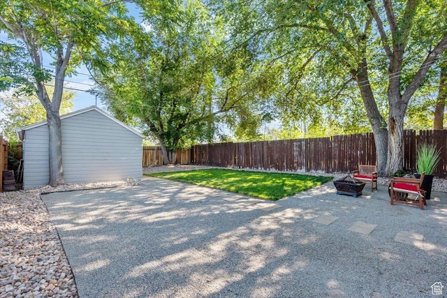 851 E Elm Ave, Salt Lake City, UT 84106 - fenced backyard featuring a patio area and an outdoor structure