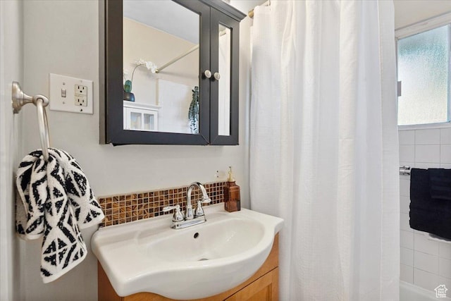 851 E Elm Ave, Salt Lake City, UT 84106 - bathroom featuring vanity, tasteful backsplash, and shower / tub combo with curtain