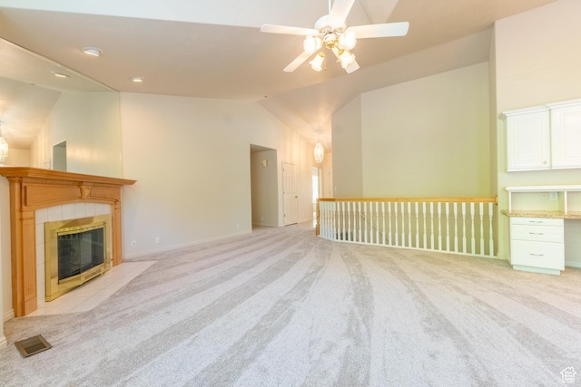 571 E Golden Pheasant Dr, Draper, UT 84020 - unfurnished living room with light carpet, vaulted ceiling, ceiling fan, a fireplace, and recessed lighting