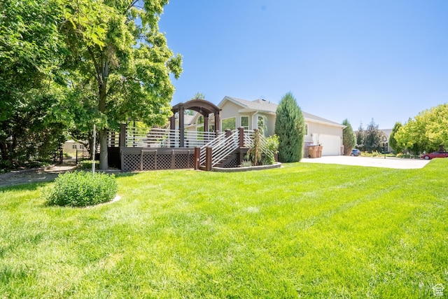 571 E Golden Pheasant Dr, Draper, UT 84020 - obstructed view of property featuring a front lawn, concrete driveway, a garage, and stucco siding