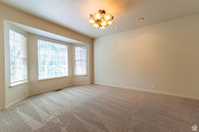 571 E Golden Pheasant Dr, Draper, UT 84020 - spare room featuring a chandelier and light colored carpet