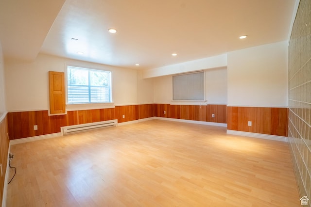 571 E Golden Pheasant Dr, Draper, UT 84020 - spare room featuring baseboard heating, a wainscoted wall, light wood-style flooring, recessed lighting, and wood walls