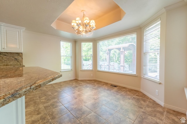 571 E Golden Pheasant Dr, Draper, UT 84020 - unfurnished dining area with a chandelier, a raised ceiling, ornamental molding, and light tile patterned floors