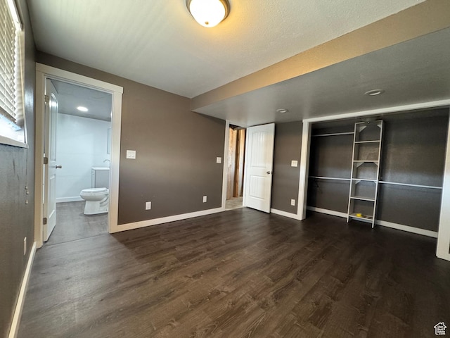 631 W Main St W, Wellington, UT 84542 - unfurnished bedroom with dark wood-style floors, ensuite bathroom, a closet, and recessed lighting