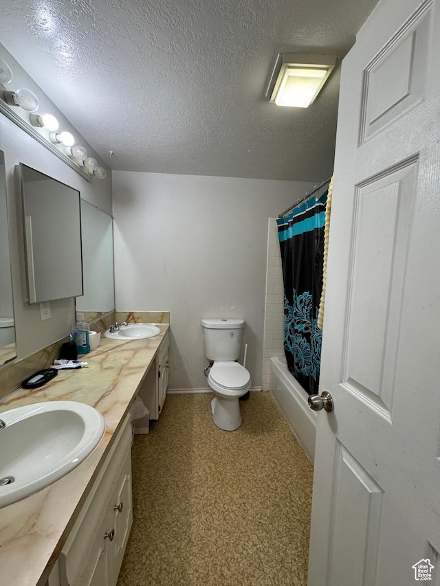 631 W Main St W, Wellington, UT 84542 - full bath featuring double vanity, a textured ceiling, and shower / tub combo with curtain