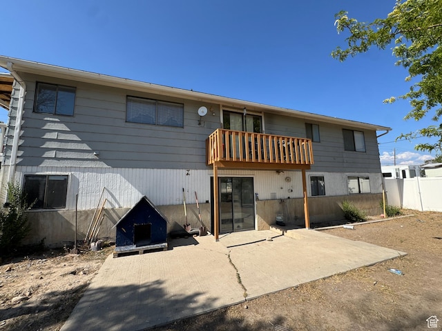631 W Main St W, Wellington, UT 84542 - back of property with a patio area and a balcony