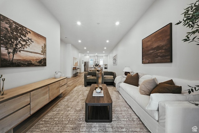 2009 E Beverly Dr S, Holladay, UT 84117 - living room featuring dark wood-style flooring and recessed lighting