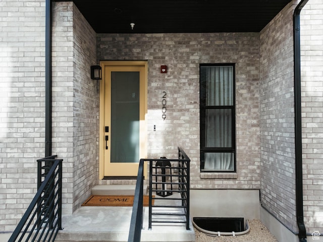 2009 E Beverly Dr S, Holladay, UT 84117 - doorway to property featuring brick siding