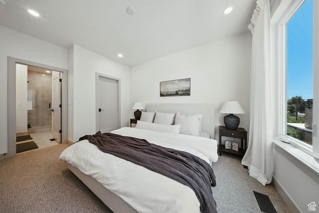 2009 E Beverly Dr S, Holladay, UT 84117 - bedroom featuring light colored carpet, recessed lighting, and ensuite bathroom