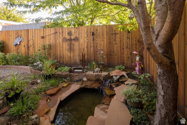 460 E Bowen Cir, Moab, UT 84532 - view of yard featuring a small pond